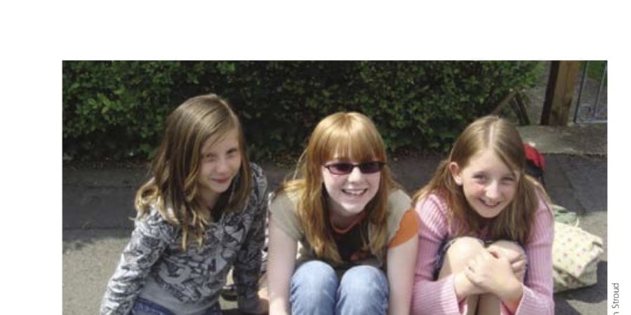 The author's daughter Sarah (center) with her new English friends, Lily and Mabel.