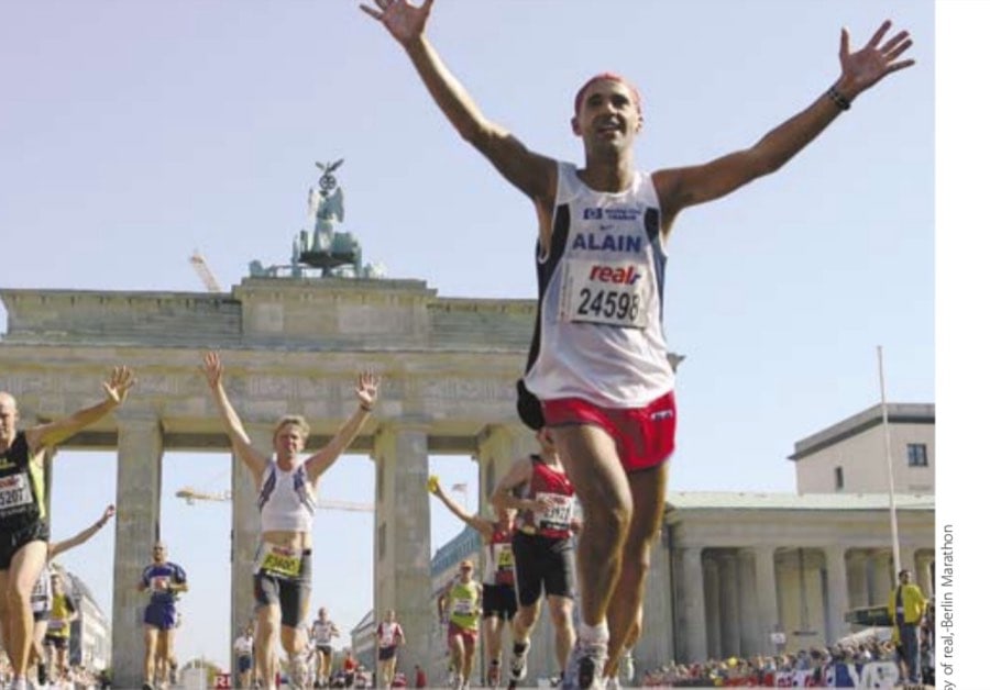 Health Advice For International Marathons 14 Runners pass through the historic Brandenburg Gate at the Berlin Marathon.
