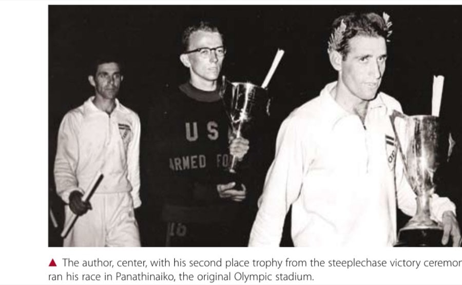 Along And Dusty Run 13 The author, center, with his second place trophy from the steeplechase victory ceremony, ran his race in Panathinaiko, the original Olympic stadium.