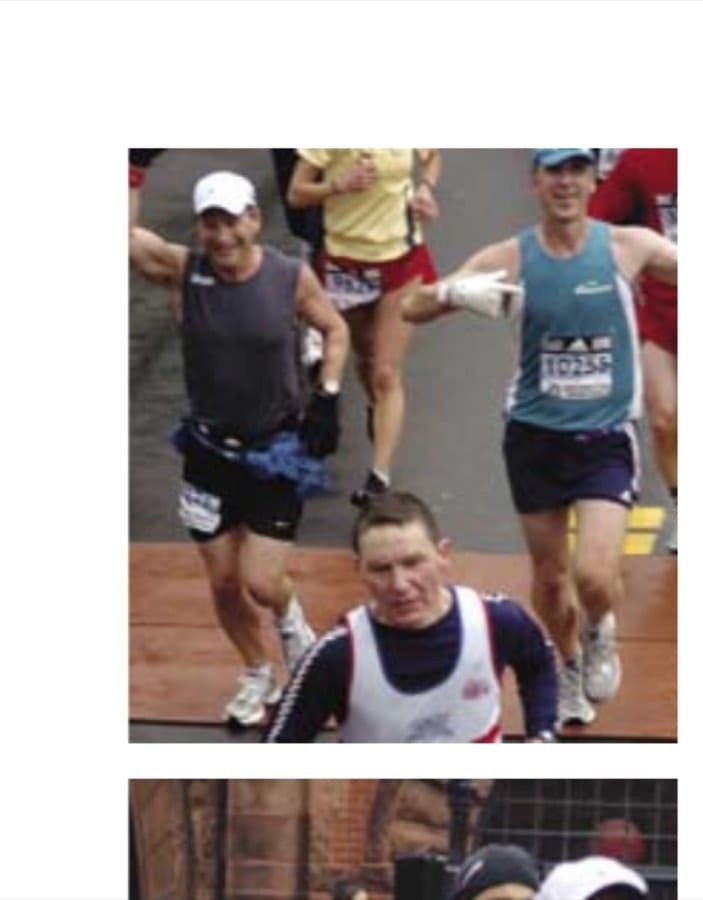 Top: About 22 miles into their friendship, Peter Muzikants (10255) and the author (8271) conquer the Newton Hills in the 2007 Boston Marathon.