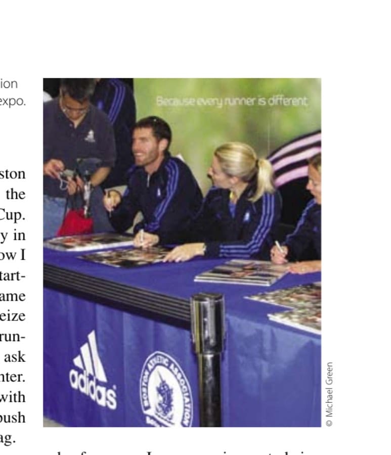 My Most Unforgettable Marathon (Vol. 15, No. 2) 9 Ian Dobson and National Champion Carrie Tollefson sign posters at the expo.