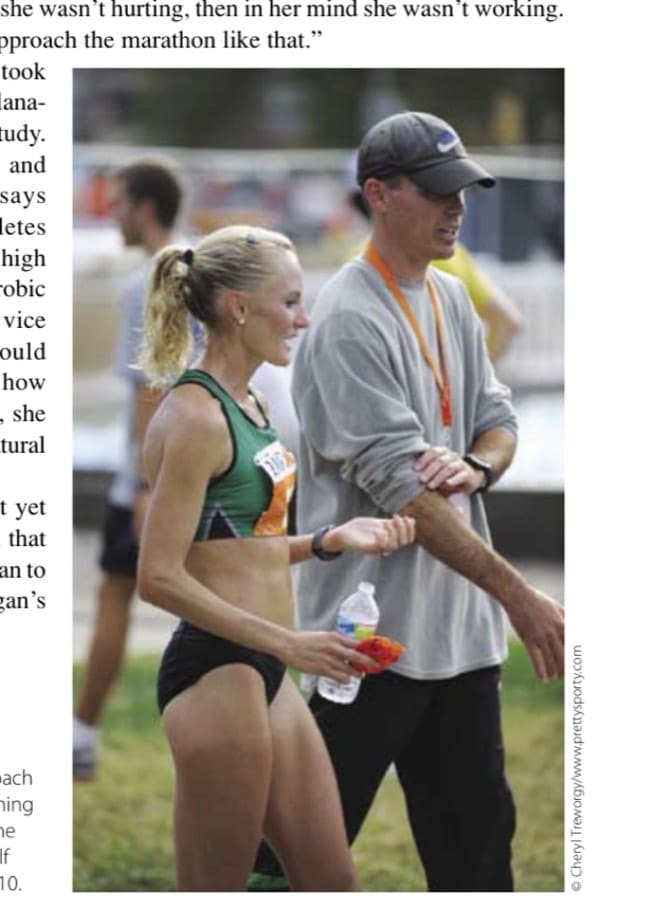 Flanagan confers with coach Jerry Schumacher after running a personal best 1:08:36 at the Rock 'n' Roll Philadelphia Half Marathon on October 1, 2010.