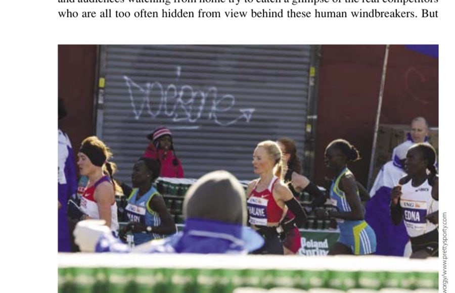 The elite women's field rumbles past an aid station in the early miles.