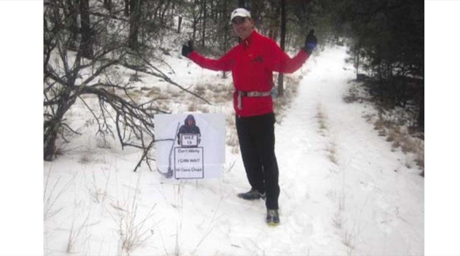 Greg Henneman feeling good at mile 13 on the spur trail. While the lower elevations of the run were unseasonably warm, runners faced ice and snow at higher altitudes.