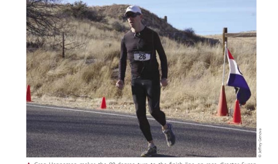 Greg Henneman makes the 90-degree turn to the finish line on race director Susan Reynolds's property.
