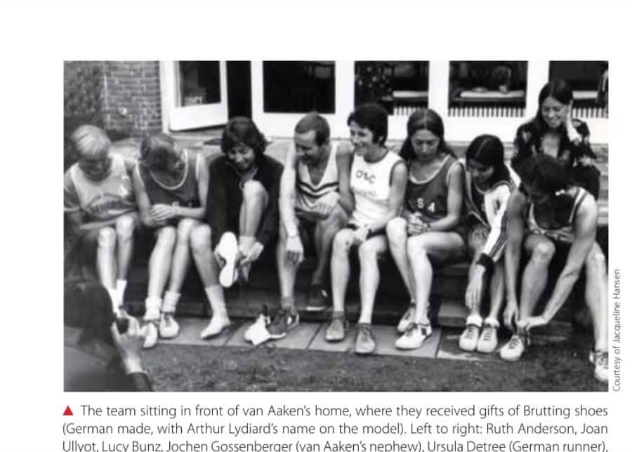 The team sitting in front of van Aaken's home, where they received gifts of Brutting shoes (German made, with Arthur Lydiard's name on the model). Left to right: Ruth Anderson, Joan Ullyot, Lucy Bunz, Jochen Gossenberger (van Aaken's nephew), Ursula Detree (German runner), Marilyn Paul, Judy Ikenberry, Anni Pede-Erdkamp, and the author, behind Anni.