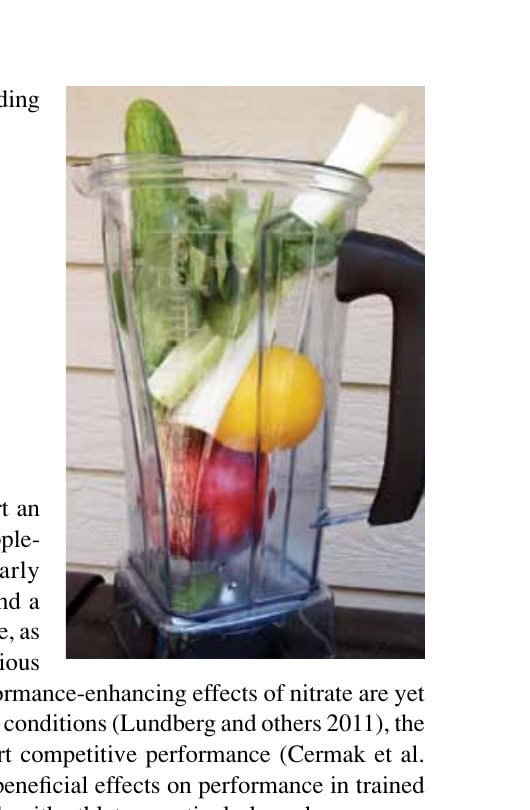 Nitrate Supplementation and Endurance Performance 9 A blender filled with fresh vegetables including cucumber, celery, and other greens for a nitrate-rich juice.