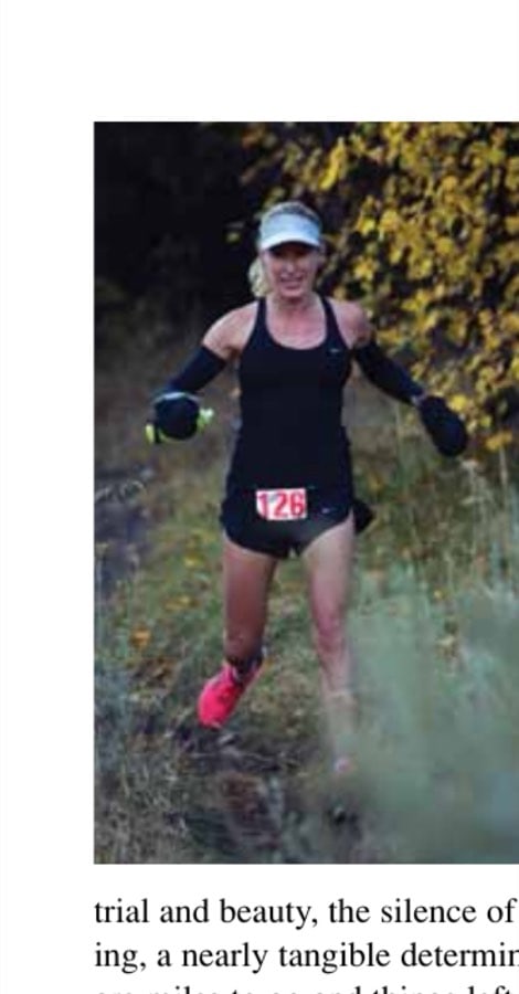 Painting On Walls 42 Denise Bourassa comes out of the copse of fall-colored leaves, through the high grass, holding her speed on the downhill.