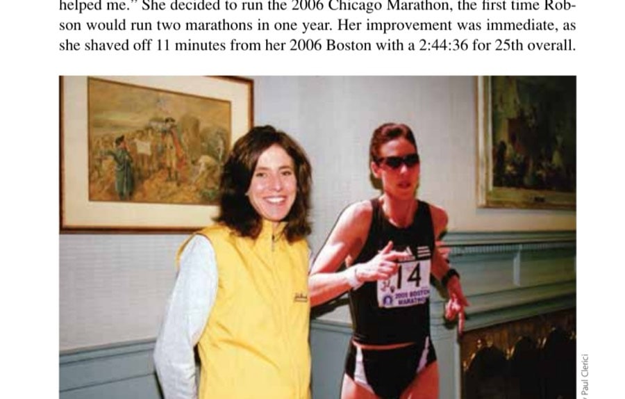 Located inside the old John Hancock Elite Athlete Village, Denise Robson of Canada stands near a life-size cutout of herself from when she ran in the 2008 Boston Marathon.
