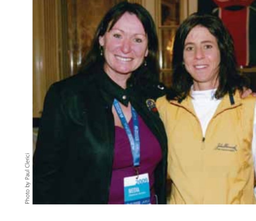 At one of the many Boston Marathon press conferences attended by former, current, and future champions, Denise Robson meets Lorraine Moller of New Zealand, only the second woman to win both the women's open (1984) and women's masters (1996) titles at Boston.