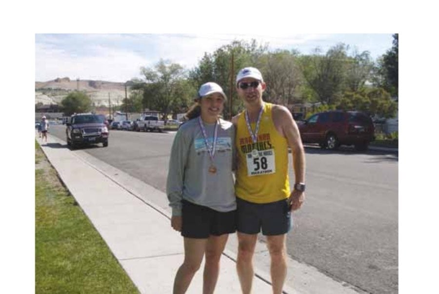 Many years later, the craziness continues for Kayla and her dad at Wyoming's Run With the Horses Marathon.