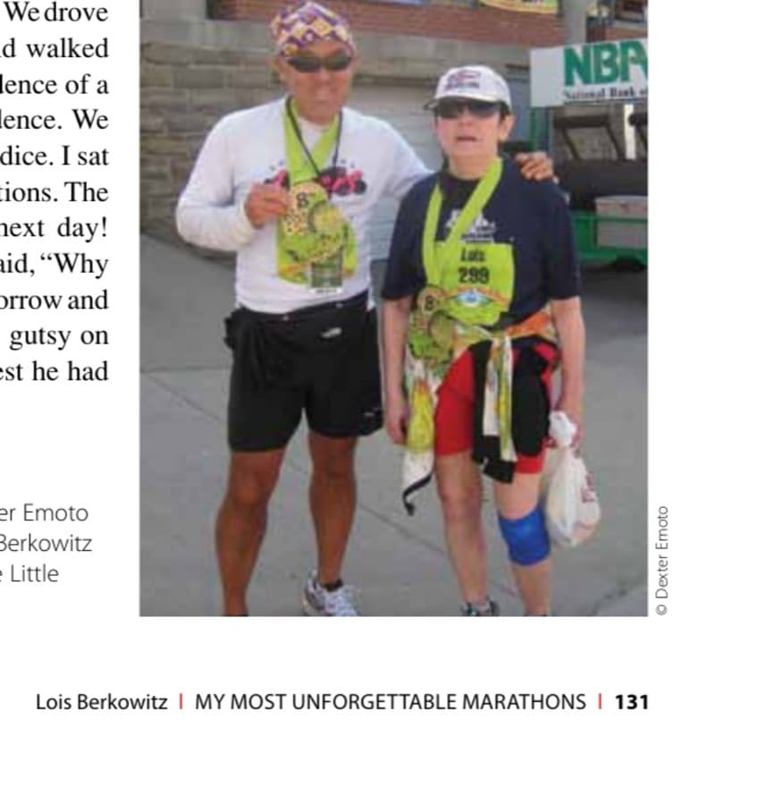 Avid photographer Dexter Emoto and wounded warrior Lois Berkowitz pose after their finish at the Little Rock Marathon.