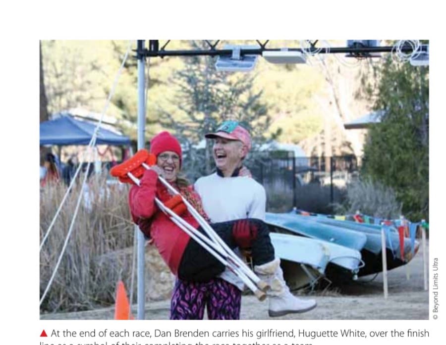At the end of each race, Dan Brenden carries his girlfriend, Huguette White, over the finish line as a symbol of their completing the race together as a team.