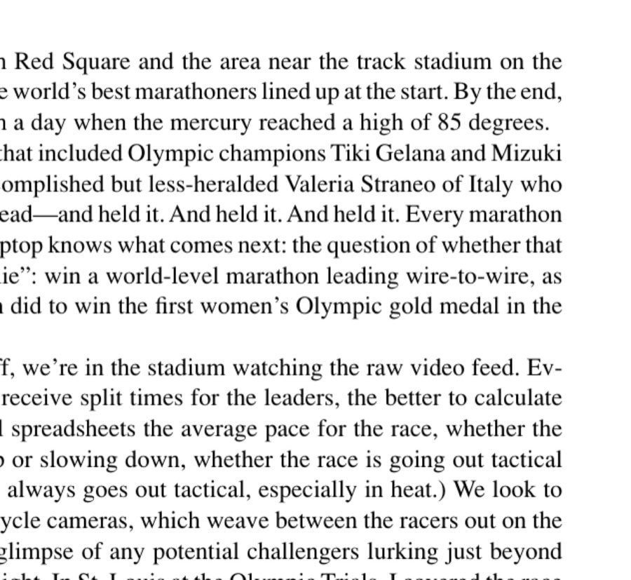 The author watches the live feed of the race inside Luzhniki Stadium.