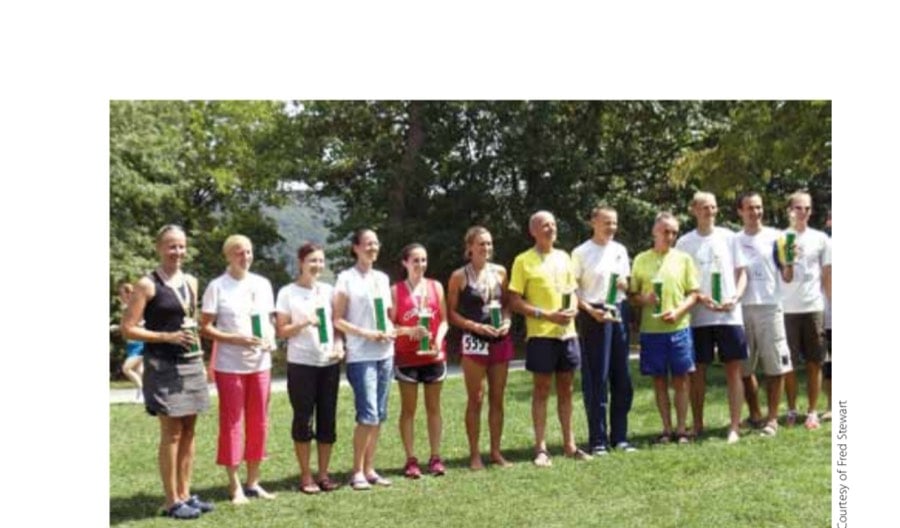 It's Not About the Shirt 10 Anne (far left) receives her age group award.