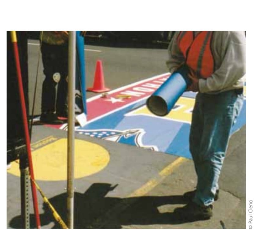 Building Boston 5 The Boston Marathon finish line that is seen on race day is a laminated mat that is applied in pieces over the painted finish line that is seen throughout the rest of the year.