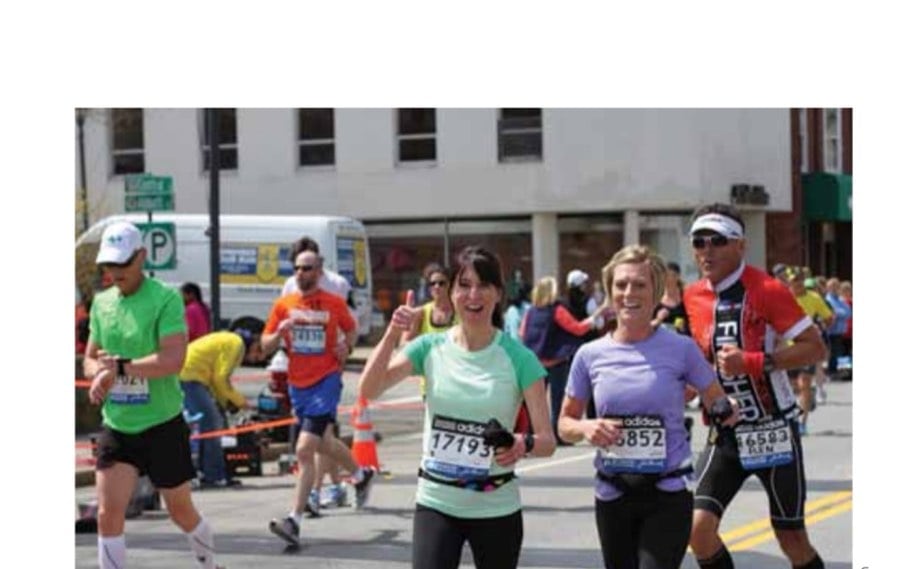 Bombs On Boylston 8 Kara Zech Thelen (17193) rode a wave of love from cheering spectators.