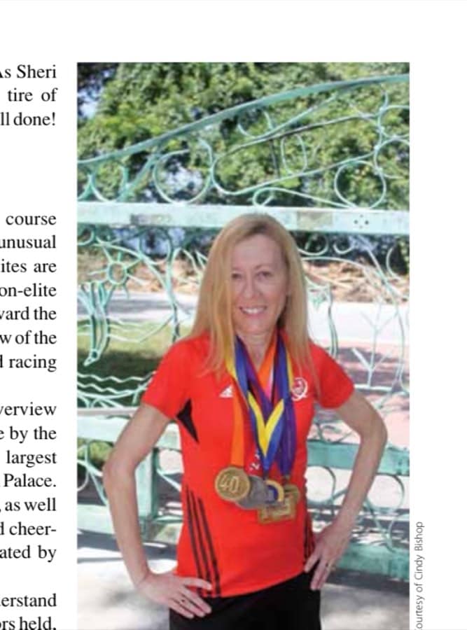 Author Cindy Bishop wears medals from all six World Marathon Majors after finishing the Tokyo Marathon.