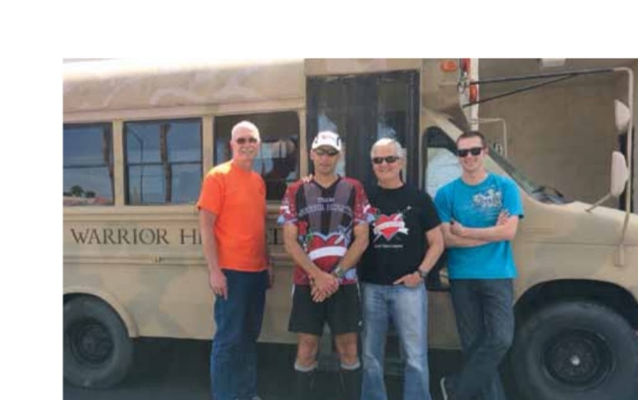 Fifteen miles from finishing, Brian stops to pose with Team Warrior Hearted. From left to right: Richard White, Brian Keltner, Coach Bill Lockton, and Garrett White. Not pictured: Judith Keltner and Steve Young.