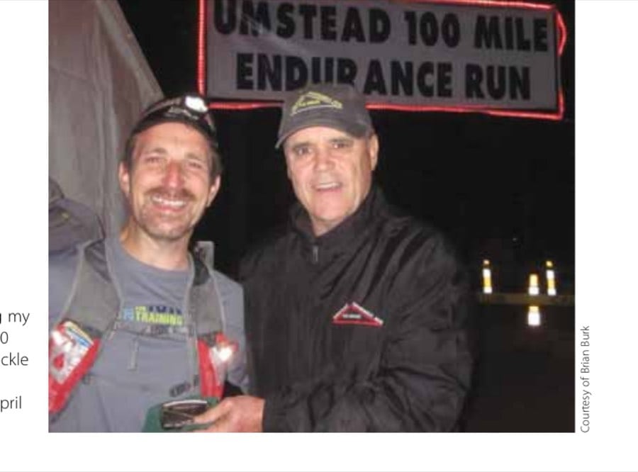 Receiving my Umstead 100 Mile belt buckle from Blake Norwood, April 2014.