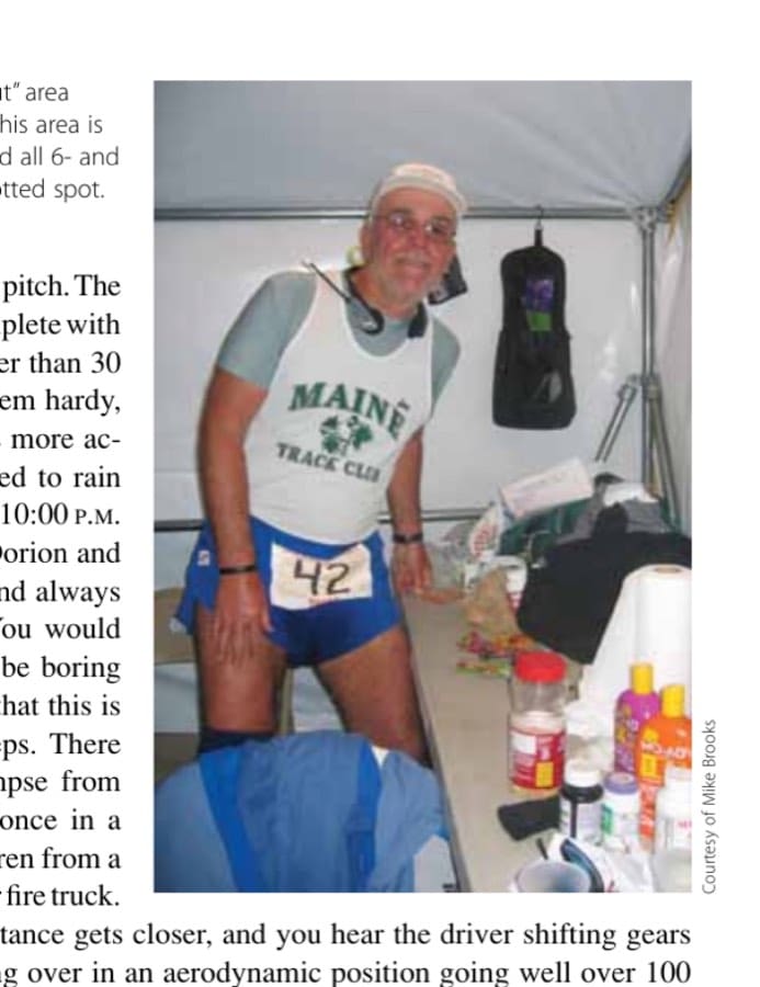 The author in the "dugout" area with his running supplies. This area is right next to the course, and all 6- and 10-day runners have an allotted spot.