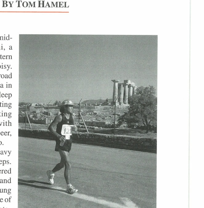 A Spartathlon entrant stays on track past the temple of Hera at ancient Corinth.
