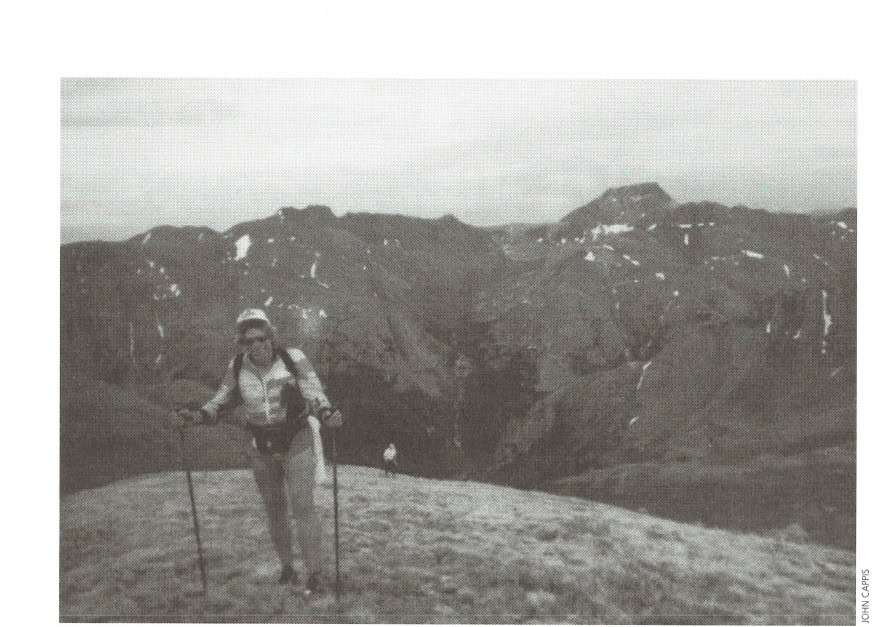 My Most Unforgettable Ultramarathon 15 The author smiles on his way up to Handies Peak.