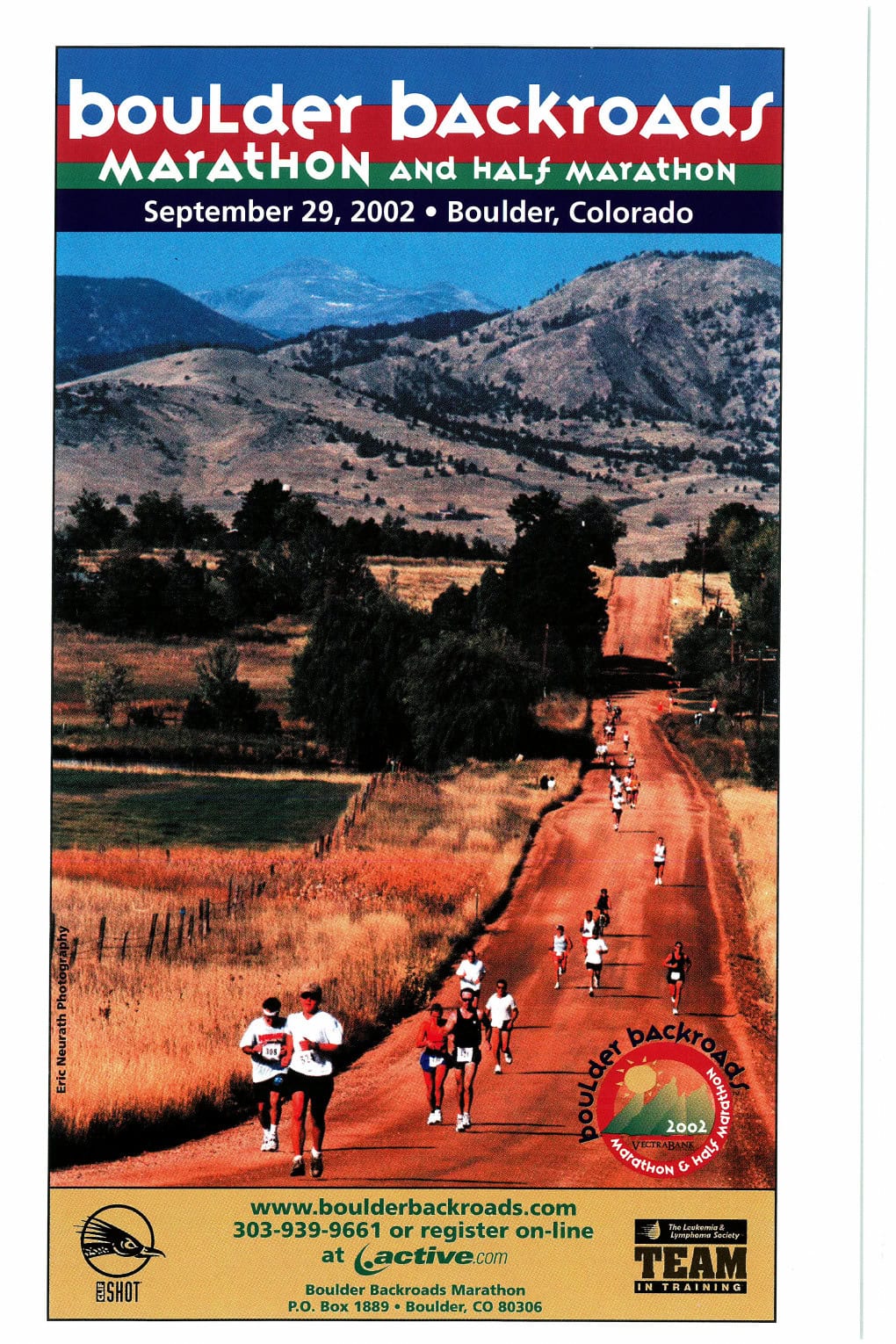 The Pheidippides Legend: The Marathon 6 Boulder Backroads Marathon and Half Marathon — September 29, 2002, Boulder, Colorado. Runners on a dirt road with the Flatirons in the background. Photo: Eric Neurath Photography.