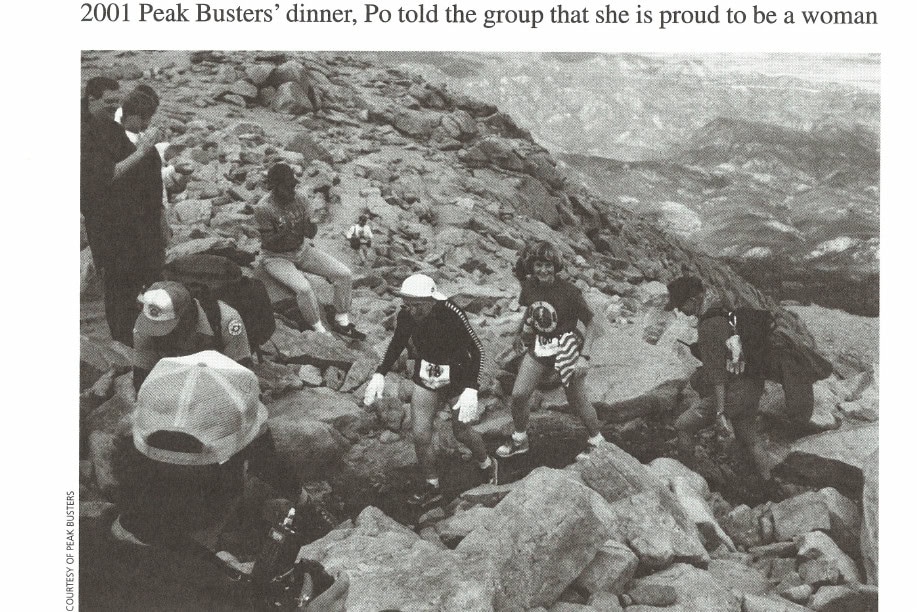 To the Peak 13 Bess James (white hat, white gloves) setting a 75-79 age-group record near Pikes Peak Summit.
