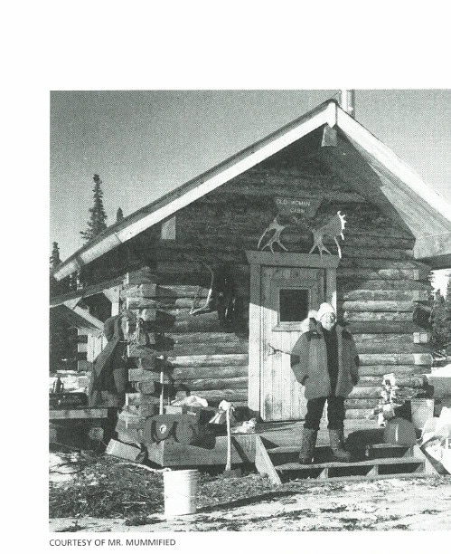 Joe Oakes outside Old Woman Cabin during his Nome to Yukon River journey.