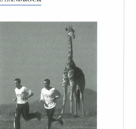 Runners and giraffes share the trail in Kenya.