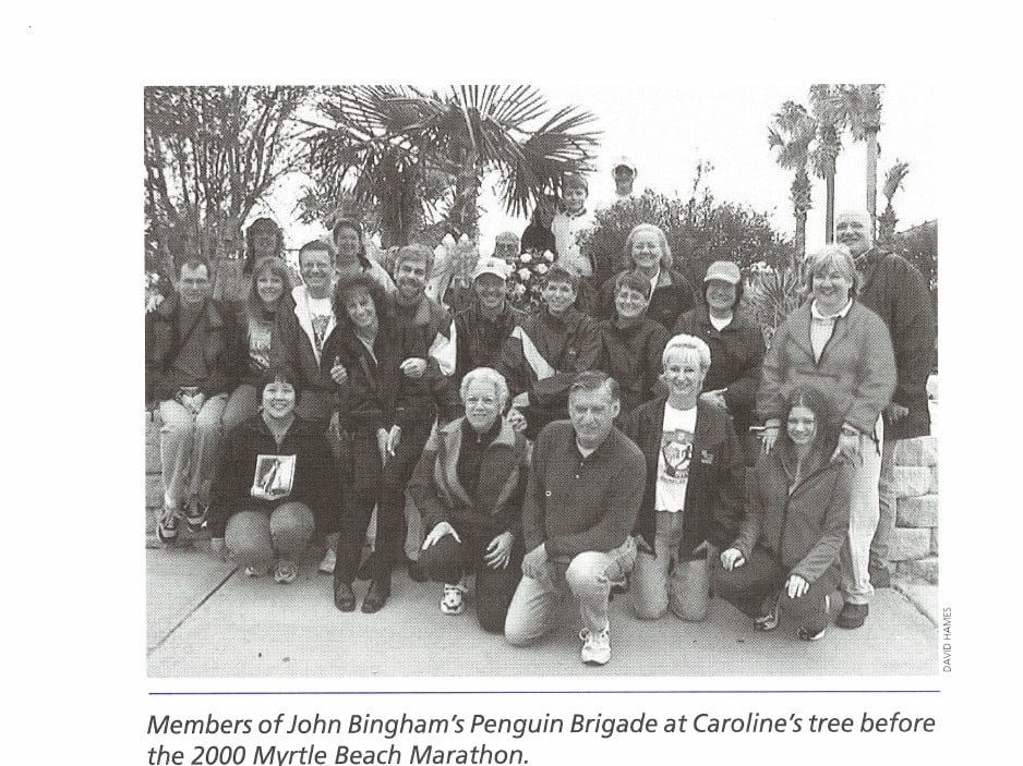 Members of John Bingham's Penguin Brigade at Caroline's tree before the 2000 Myrtle Beach Marathon.