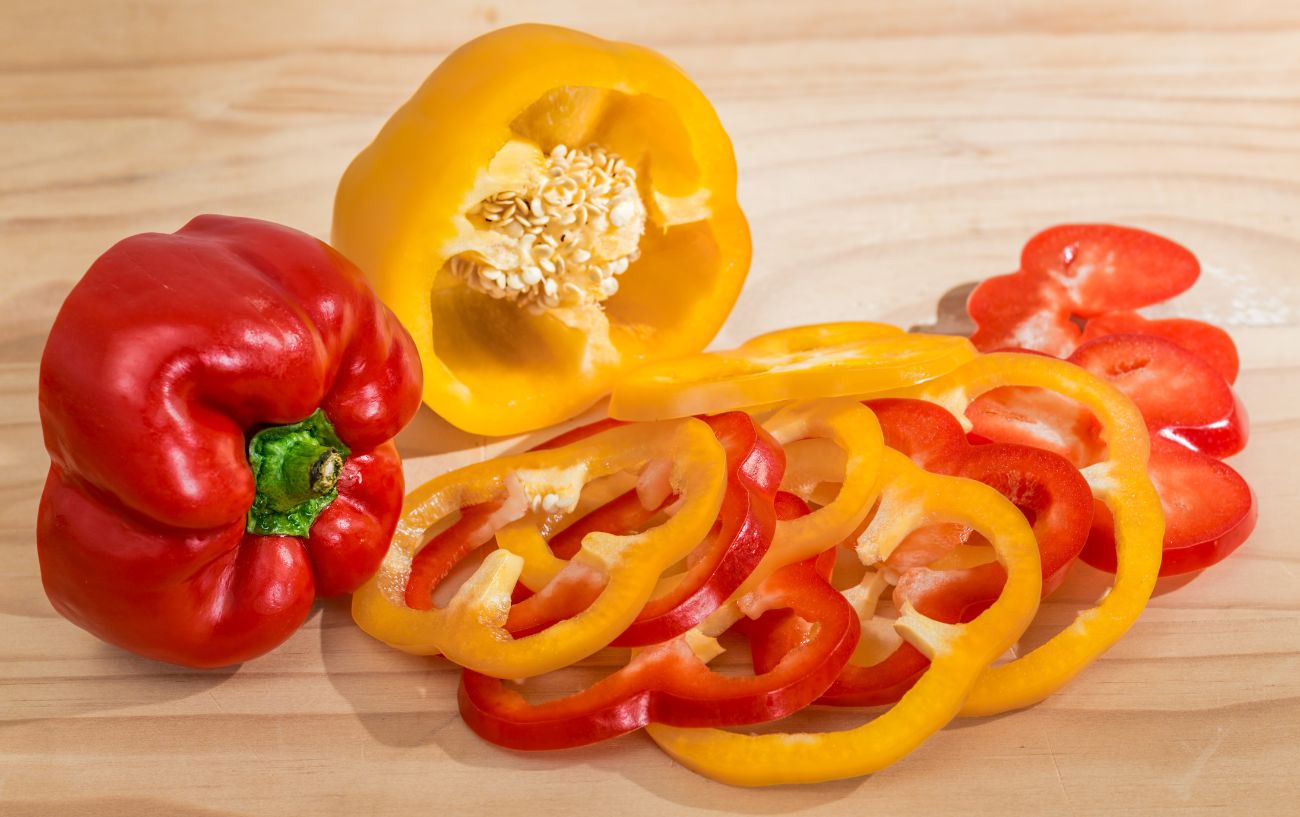 Slices yellow and red bell peppers.