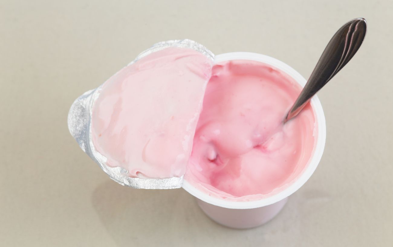 A packaged strawberry yogurt.