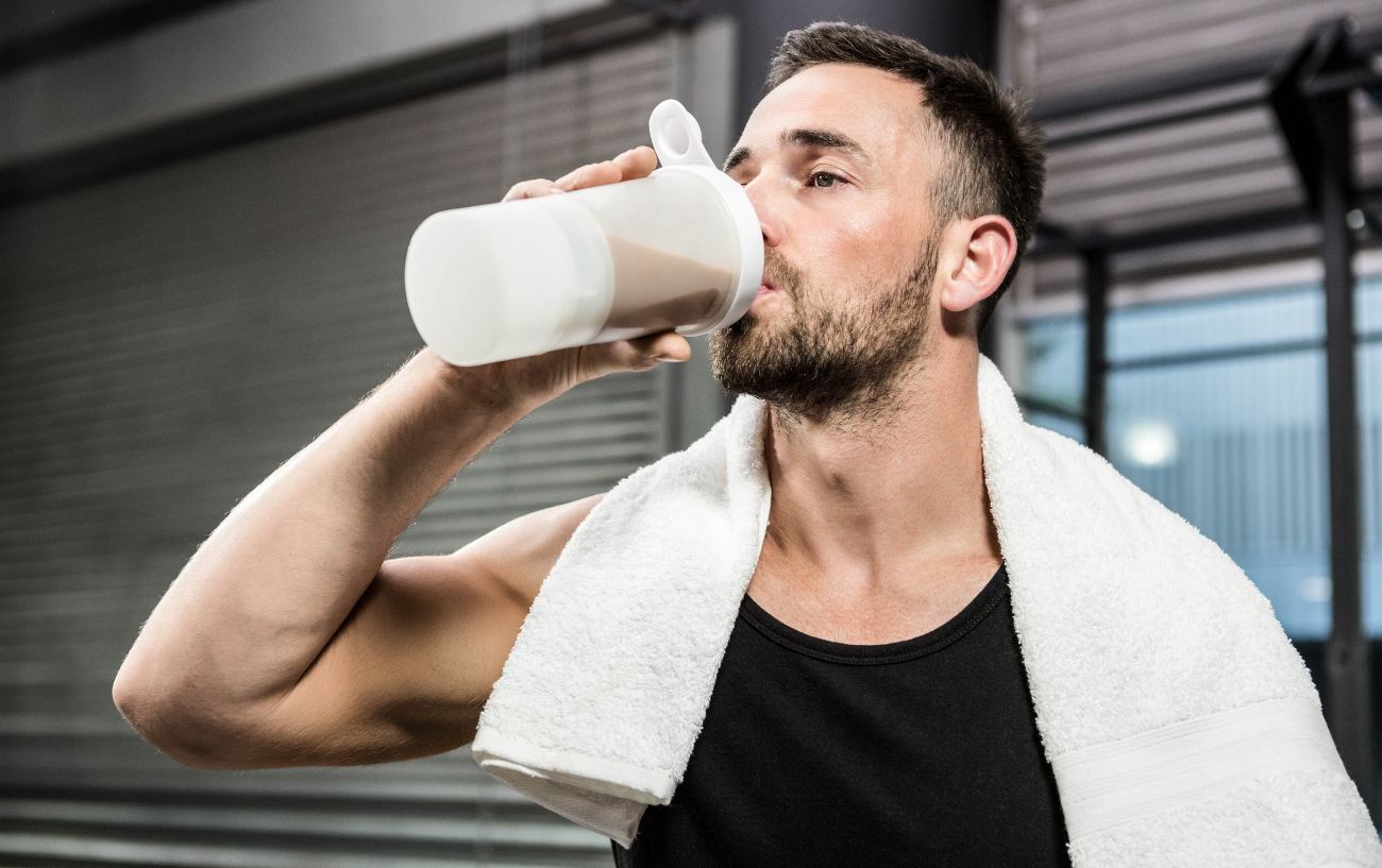 Complete vs Incomplete Proteins: What's The Difference? 10 A person drinking a protein shake.