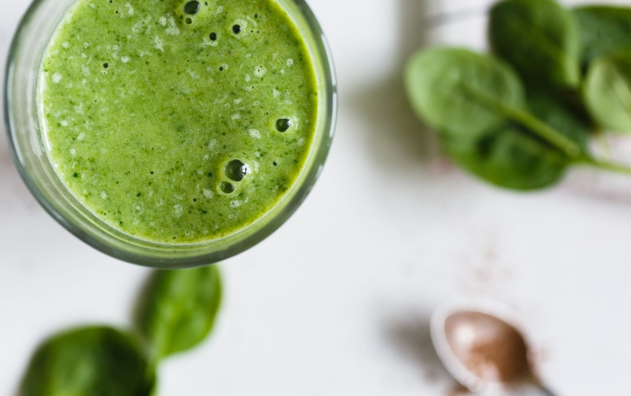 A glass of green juice.