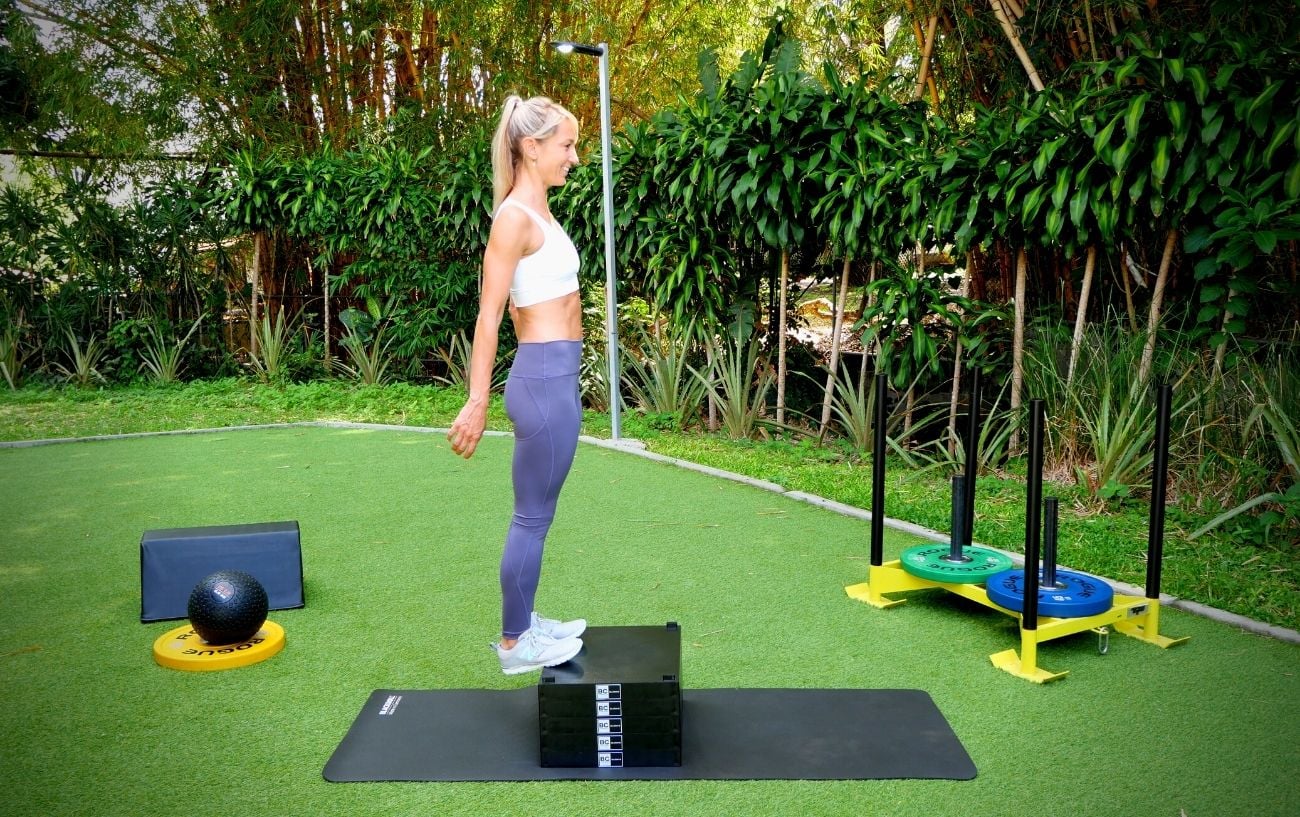 a woman standing on a platform