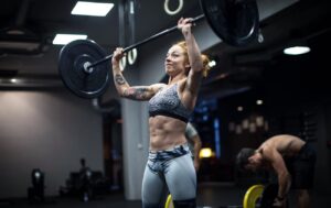 Free Weights Vs Machines: Which Is Better For Strength + Muscle?