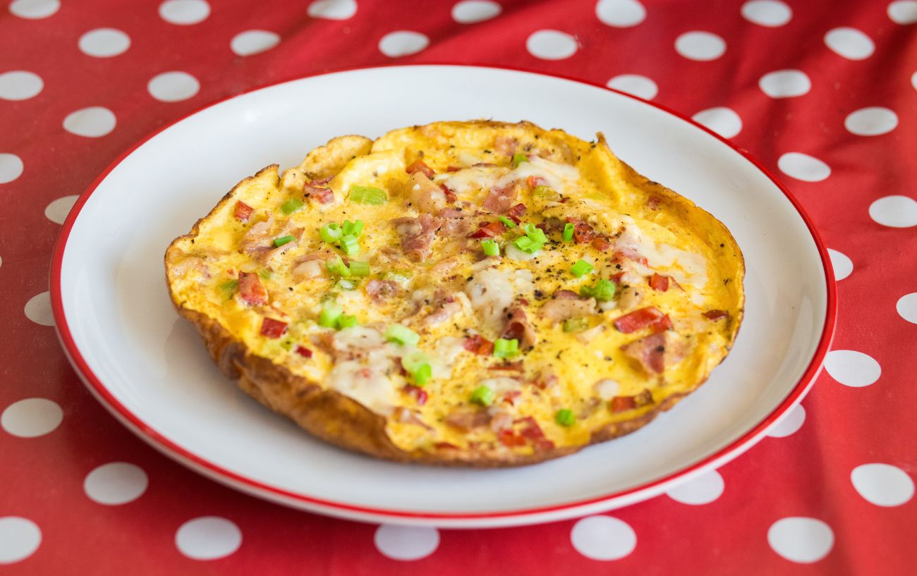The High Protein Diet Guide: Food Lists + Tips To Increase Protein Intake 8 An omlette.