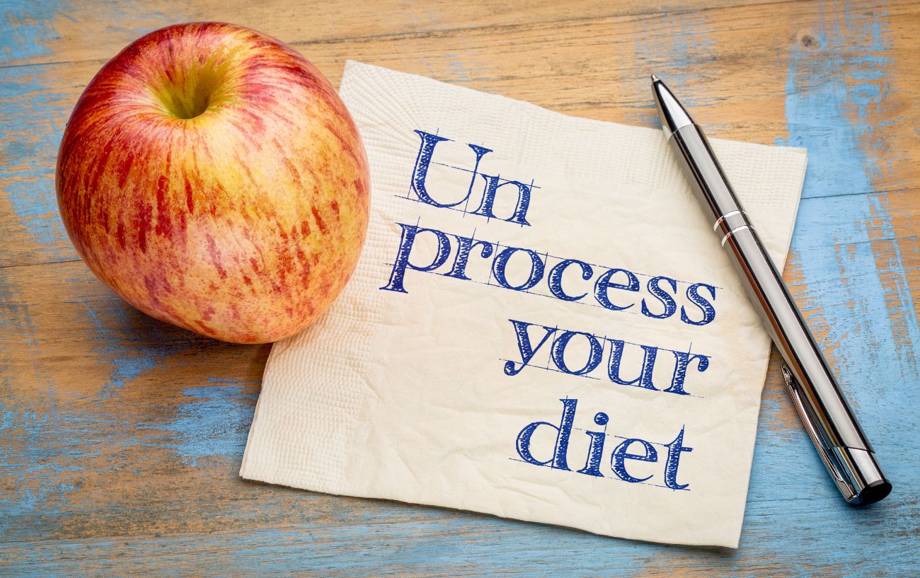 Thông điệp: 'Unprocess your diet' với một quả táo bên cạnh.