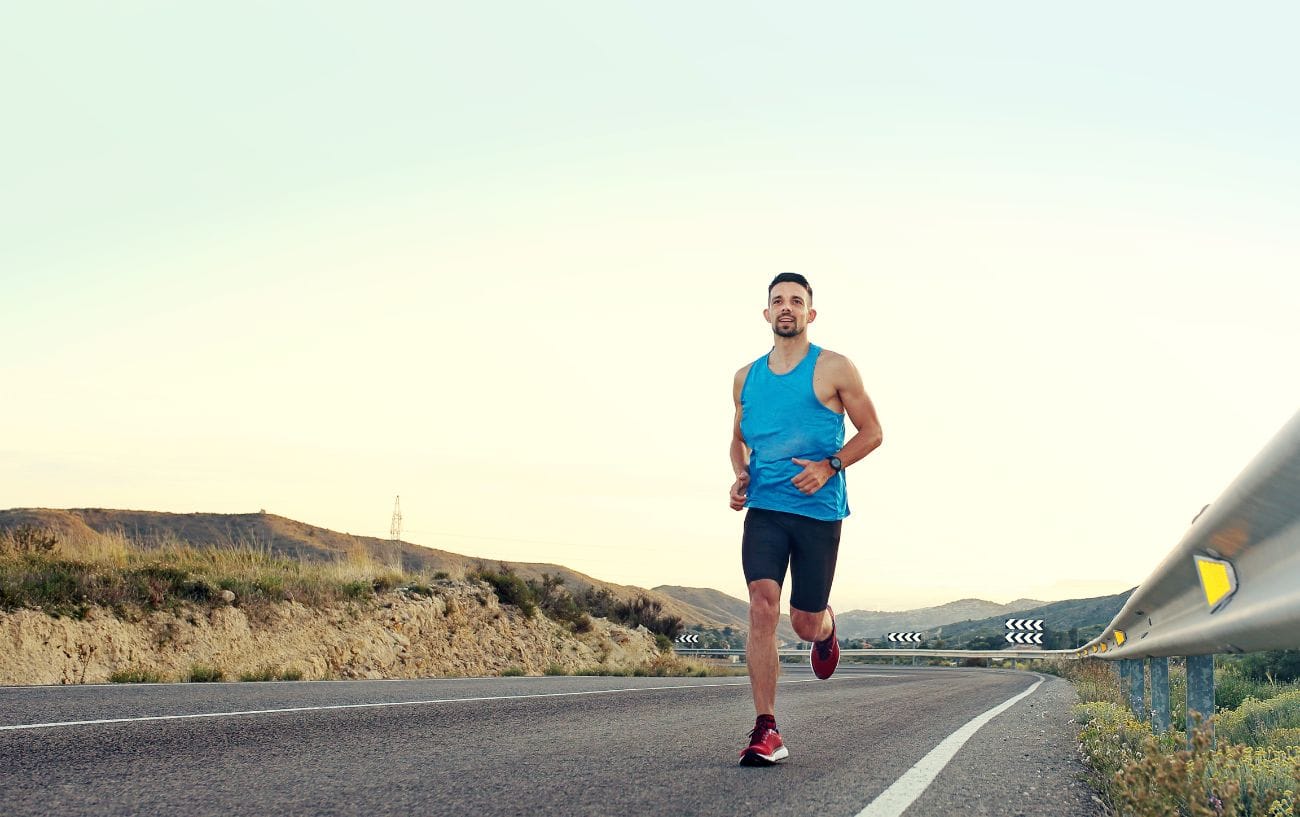How to Build the Perfect Marathon or Half Marathon Training Plan 4 a man running on a road