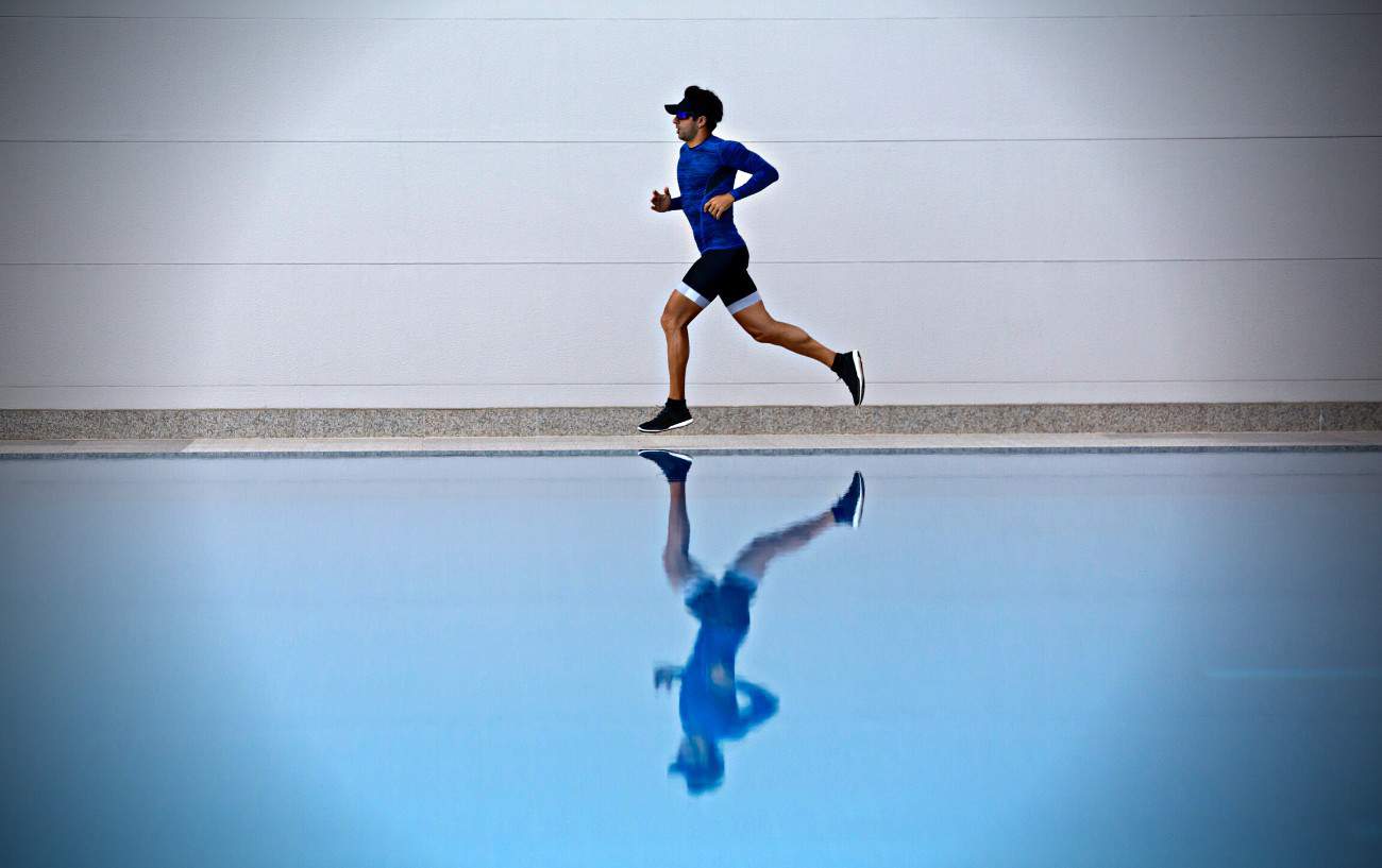How To Improve Running Form: 29 Ways To Run More Efficiently 6 A person running.