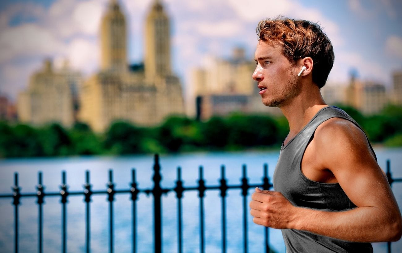 a man running near water