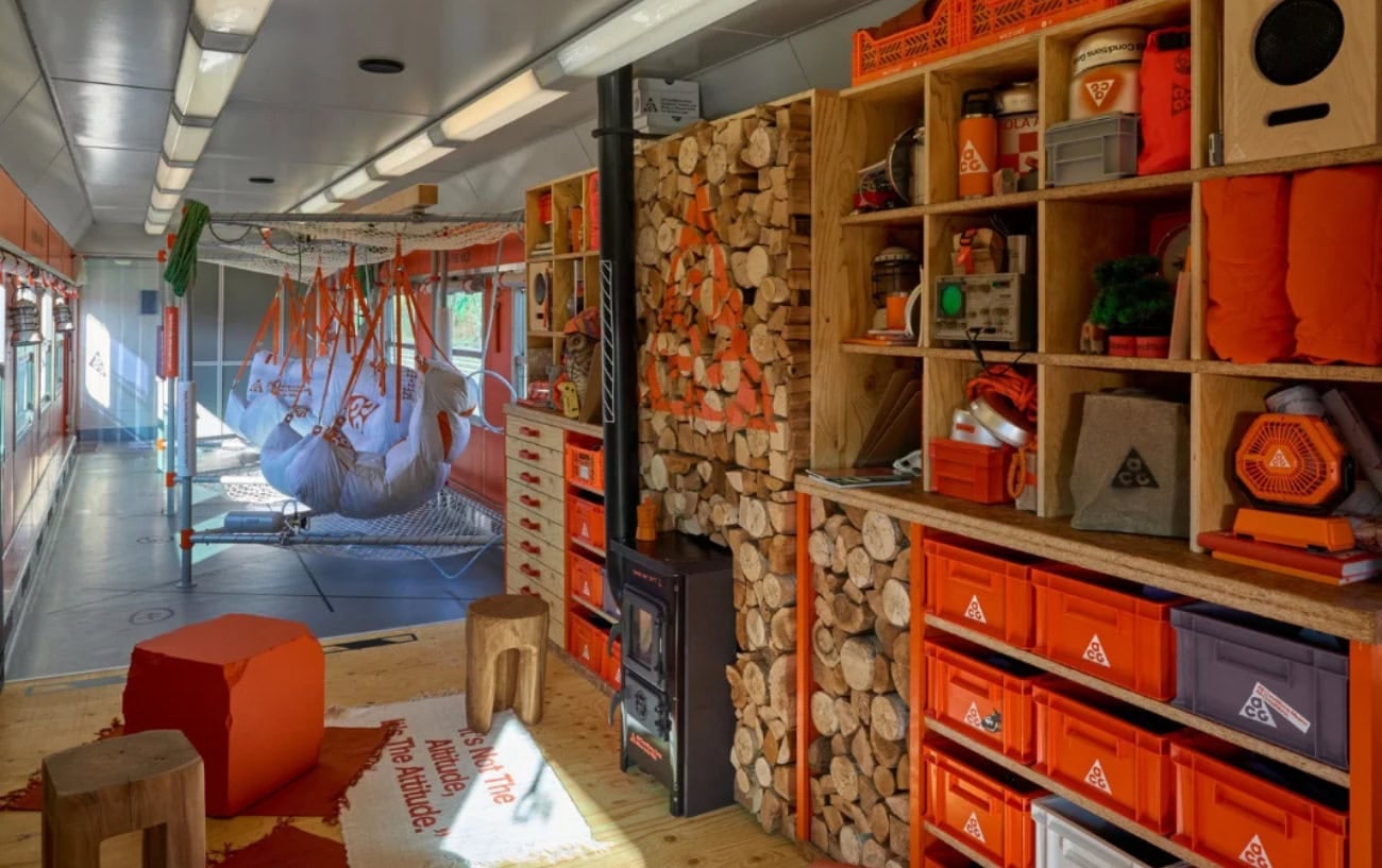 Eliud Kipchoge Was a Train Conductor for a Day At One Of Nike's Loudest Olympic Popups 2 Eliud Kipchoge Was a Train Conductor for a Day At One Of Nike's Loudest Olympic Popups 2