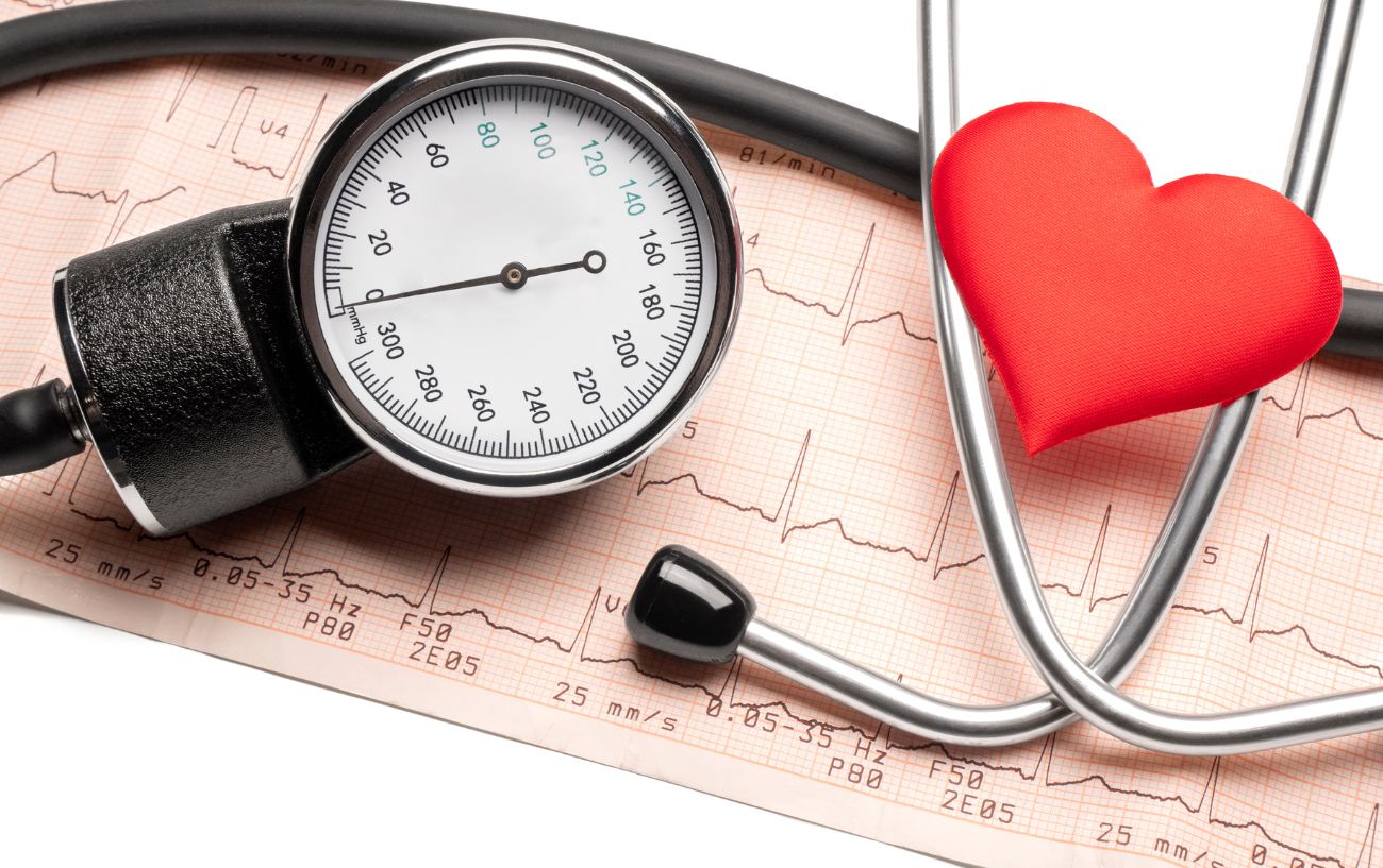 A stethoscope and electrocardiogram printout. 