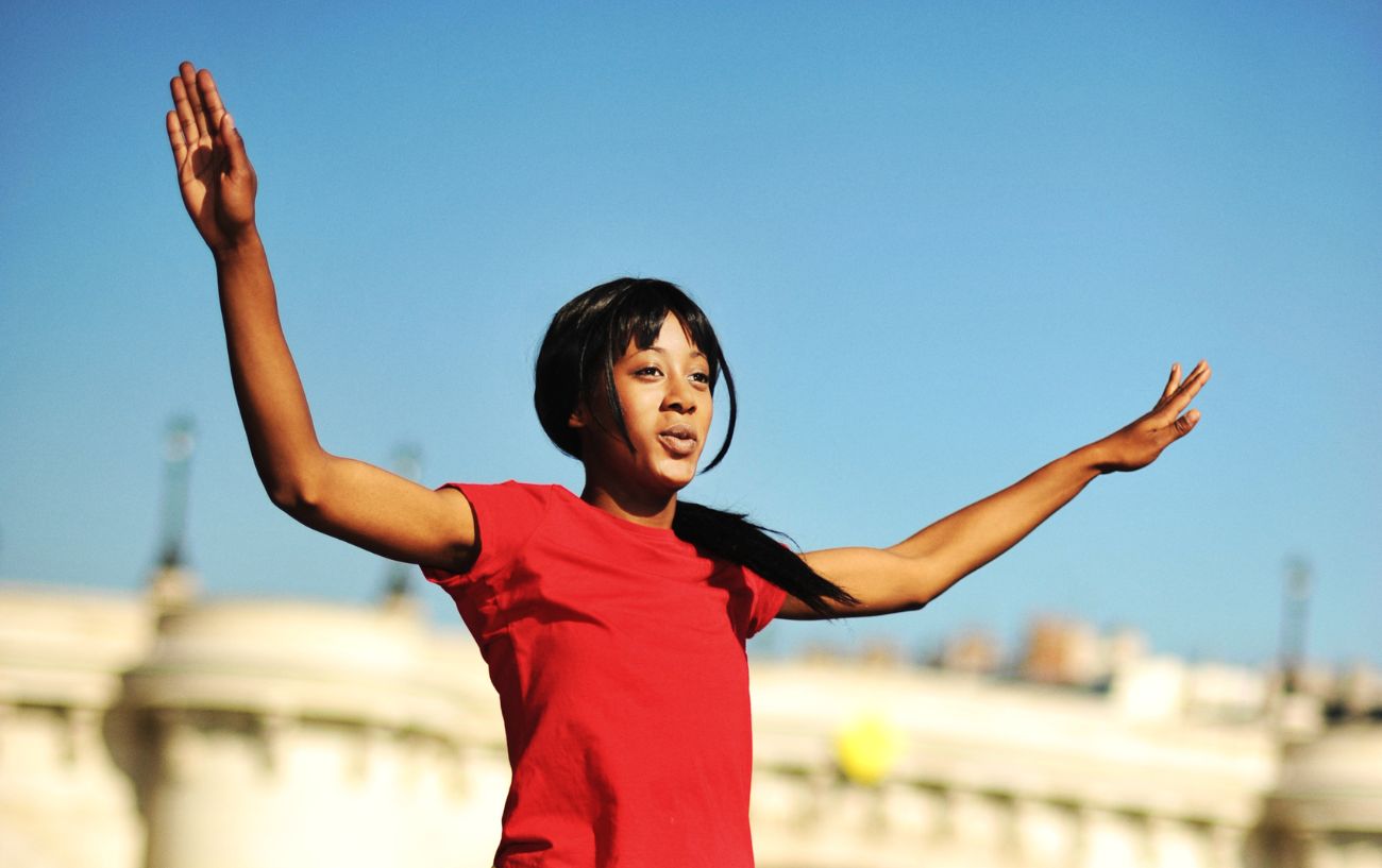 A person doing arm circles.