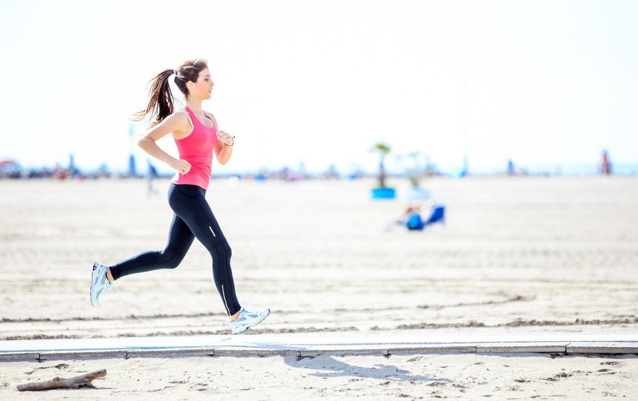 Norwegian Singles Running Method: The Secret To Unlocking New PRs? 3 Woman jogging on sandy beach