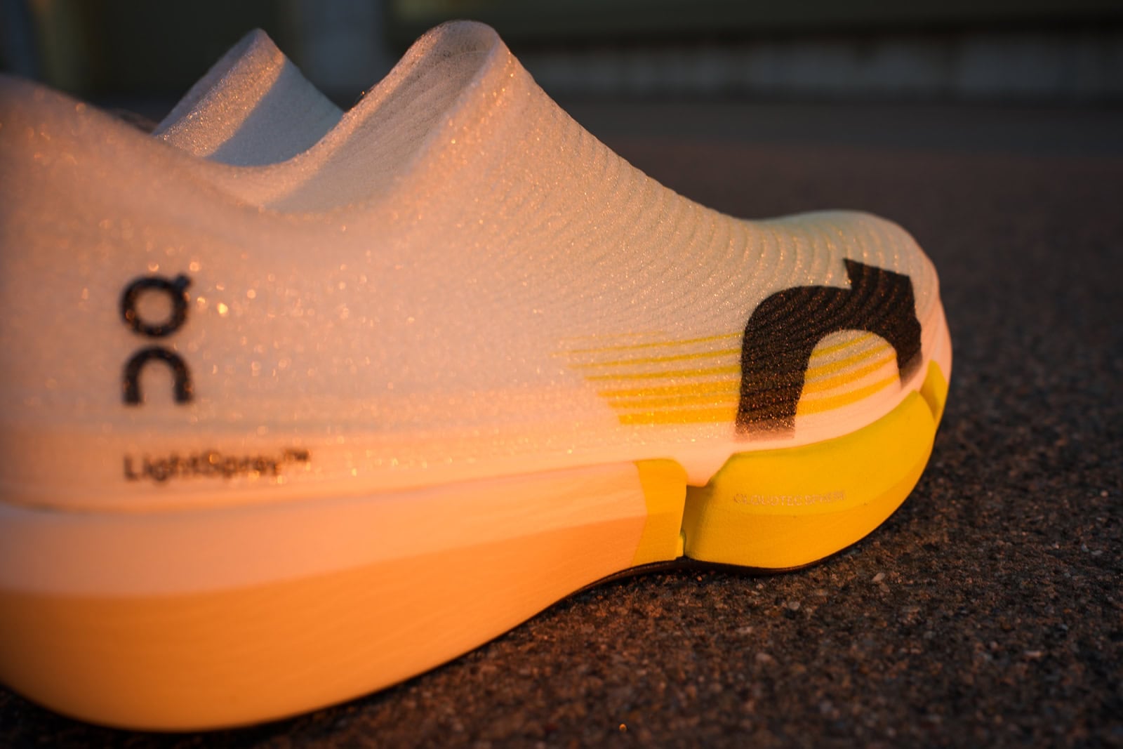 Close-up of the LightSpray branding on the Cloudboom Strike 2 upper