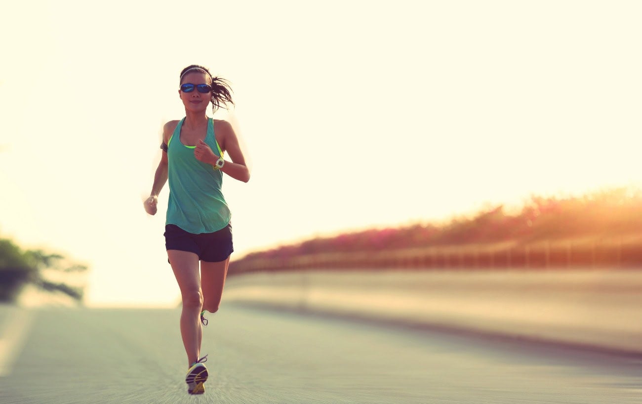 A runner training on the road.