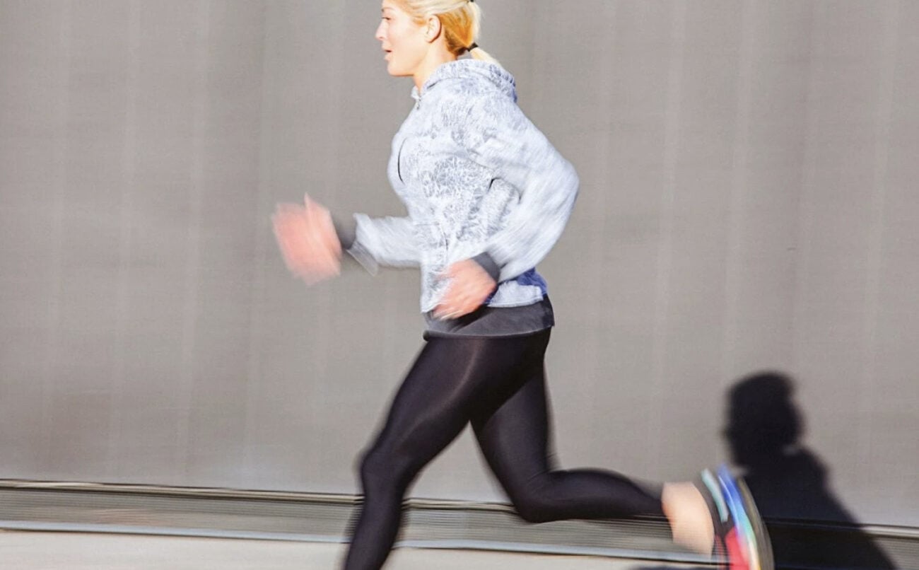 A woman running hard.